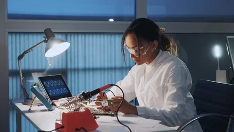 Middle close up of african american electronics engineer in protective glasses Видео 112865394