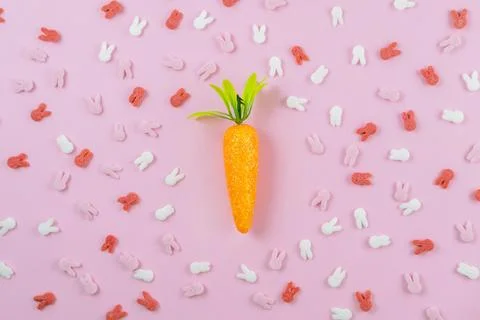 In the middle Easter pattern made of decoration with bunny ears sugar sprinkle Stock Photos