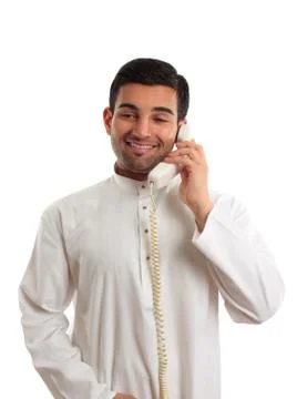 Middle eastern arab man using the telephone Stock Photos