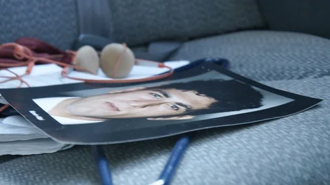  Middle eastern aspiring actor headshot photo on car back seat Stock Footage 89144019