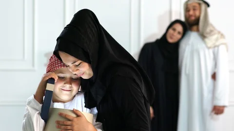 Middle Eastern boy and girl with gift box. Muslim family living lifestyle. Stock Footage 102155151