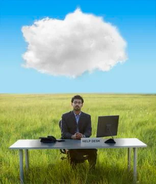 Middle Eastern businessman at help desk in field Ilustración de archivo