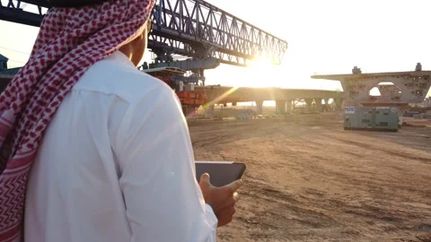 Middle eastern businessman inspecting construction work on site Stock Footage 231610203