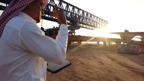 Middle eastern businessman inspecting construction work on site Stock Footage 231610379