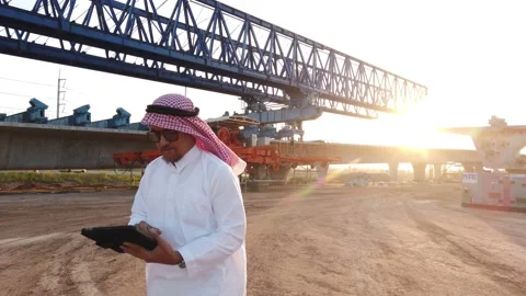 Middle eastern businessman inspecting construction work on site Stock Footage 231610690
