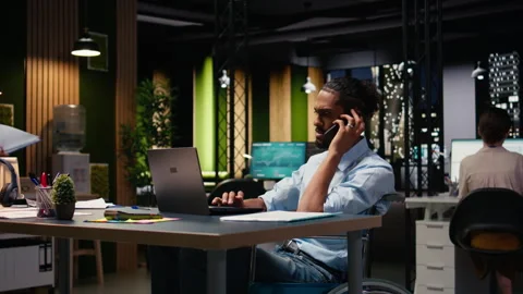 Middle Eastern businessman wheelchair user handling phone call Stock Footage 334040930
