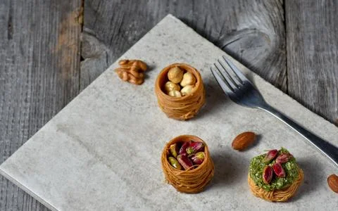 Middle Eastern dessert with on a stone plate Stock Photos
