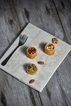 Middle Eastern dessert with on a stone plate Stock Photos