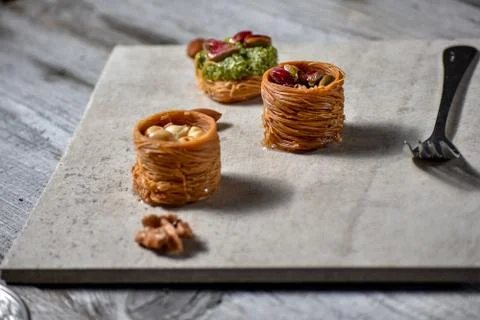 Middle Eastern dessert with on a stone plate Stock Photos