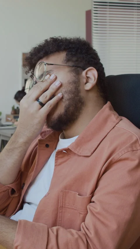Middle Eastern Developer Yawning while Working on Computer in Office Video stock 293931354