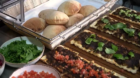 Middle Eastern Dish with Flatbreads Stock Footage 319950732