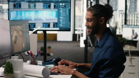 Middle eastern engineer finalizing interior design plans for a building 動画素材 316645550