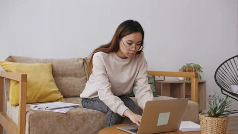Middle Eastern female remote working from home, having a video call with Stock Footage 149351609