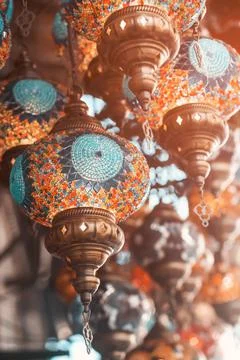 Middle Eastern lambas of different colors and sizes are hanging in the bazaar Stock Photos