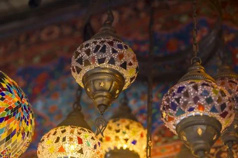 Middle Eastern lambas of different colors and sizes are hanging in the bazaar Stock Photos