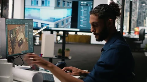 Middle eastern male developer creating property layout with furniture Stock Footage 316643437