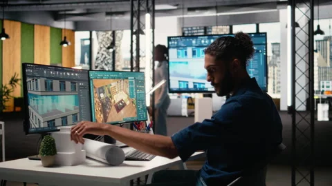 Middle eastern male developer creating property layout with furniture Stock Footage 316648939