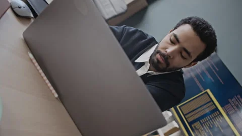 Middle Eastern Male Programmer Working on Laptop Feeling Stressed in Office Video stock 337475302