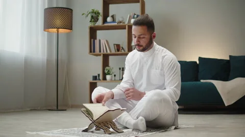 Middle Eastern man praying close-up, islamic religion. Religious holiday Ramadan Stock Footage 178634631