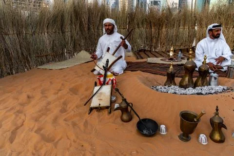 A Middle Eastern man singing and playing music | Arabic culture display Stock Photos