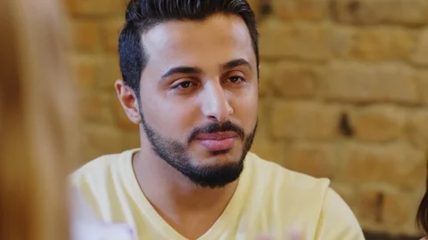 Middle Eastern Man Talking to Colleagues in Office Stock Footage 115449889