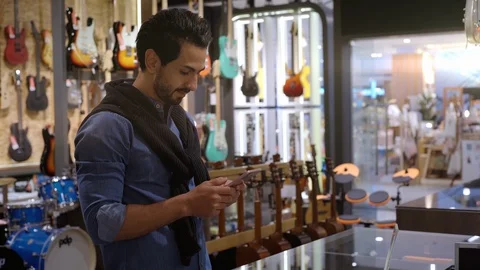 A Middle Eastern Man Using Mobile Phone To Scan QR Code Stock-Footage 120383918