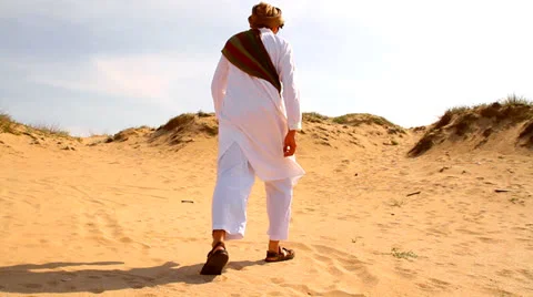 Middle Eastern Man Walking in Desert Reaching Rescue Concept HD Stock Footage 23438112
