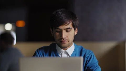 Middle Eastern man working on laptop at night Stock Footage 112114793