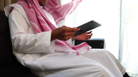 Middle eastern man working on sofa Video stock 229475736