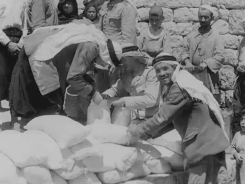 Middle Eastern men unload truck Stock Footage 158025053