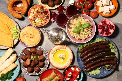 Middle eastern or arabic dishes and assorted meze, concrete rustic background Foto stock