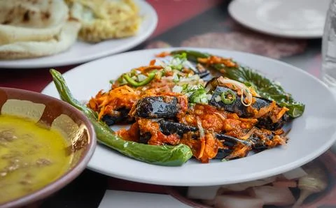 Middle eastern or Arabic dishes on the table in restaurant. Tasty tradition.. Stock Photos