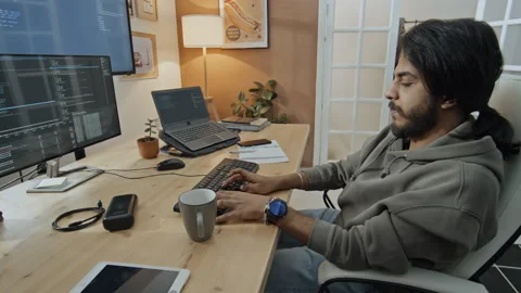 Middle Eastern Programmer Working on Computer from Home Stock Footage 255929368