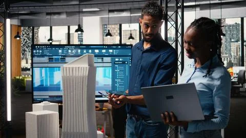 Middle eastern real estate developer presenting idea of residential layout Stock Photos