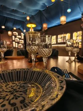 Middle eastern style table setting in a restaurant. Stock Photos