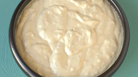 Middle Eastern tahini dip with garlic and lemon. Stock Footage 332245090