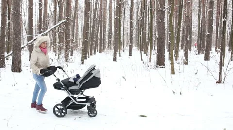 Middle eastern woman with stroller Stock Footage 57809646