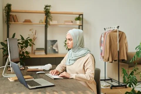 Middle Eastern Woman Working On Software 스톡 사진