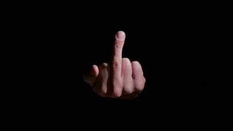 Middle finger close up symbol of aggression and negativity. Pissed off gesture o Stock Footage 130227998