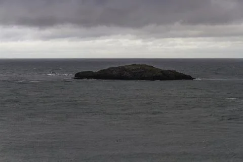 Middle Mouse or Ynys Badrig Island, off the north coast of Anglesey. Stock Photos