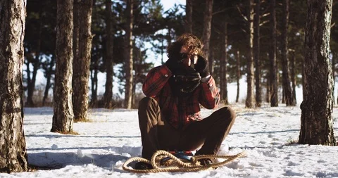 In the middle of nature a guy on the sleigh get ready to exploring a new virtual Stock Footage 111967833