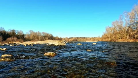 In the middle of the river the water flows impetuously Stock Footage 298501243