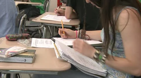 Middle school student doing work in classroom (2 of 3) Stock Footage 10326912