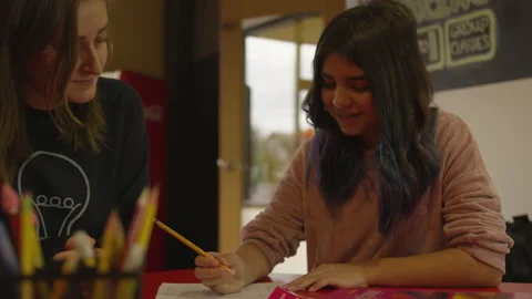 Middle School Student Understanding a Math Problem on Her Worksheet Stock Footage 208746171