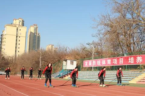Middle school students are doing roller skating training on the playground. Stock Photos