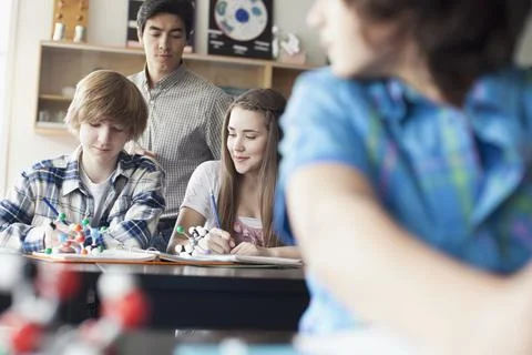 Middle school students in chemistry class Stock Photos