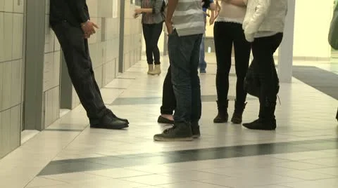 Middle school students coming into school (2 of 4) Stock Footage 8979890