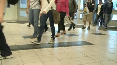 Middle school students coming into school (4 of 4) Stock Footage 8979895