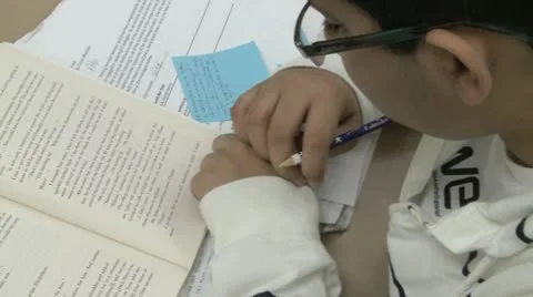 Middle school students reading in classroom. (2 of 4) Stock Footage 8977936