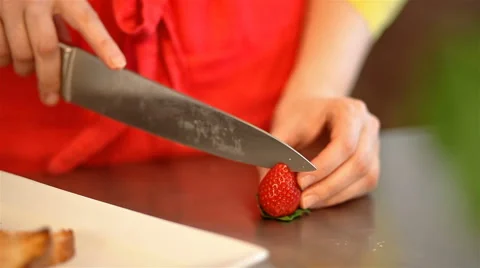 Middle shot cook slice strawberry Stock Footage 65287572